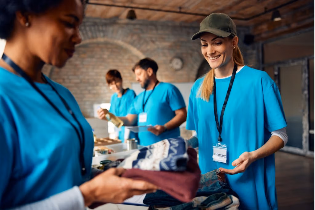 A team organising clothing for reuse